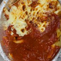 Chicken Cutlet Parmigiana with Spaghetti or Ziti · Chicken cutlet fried to a golden brown, topped with tomato sauce and mozzarella cheese then ...
