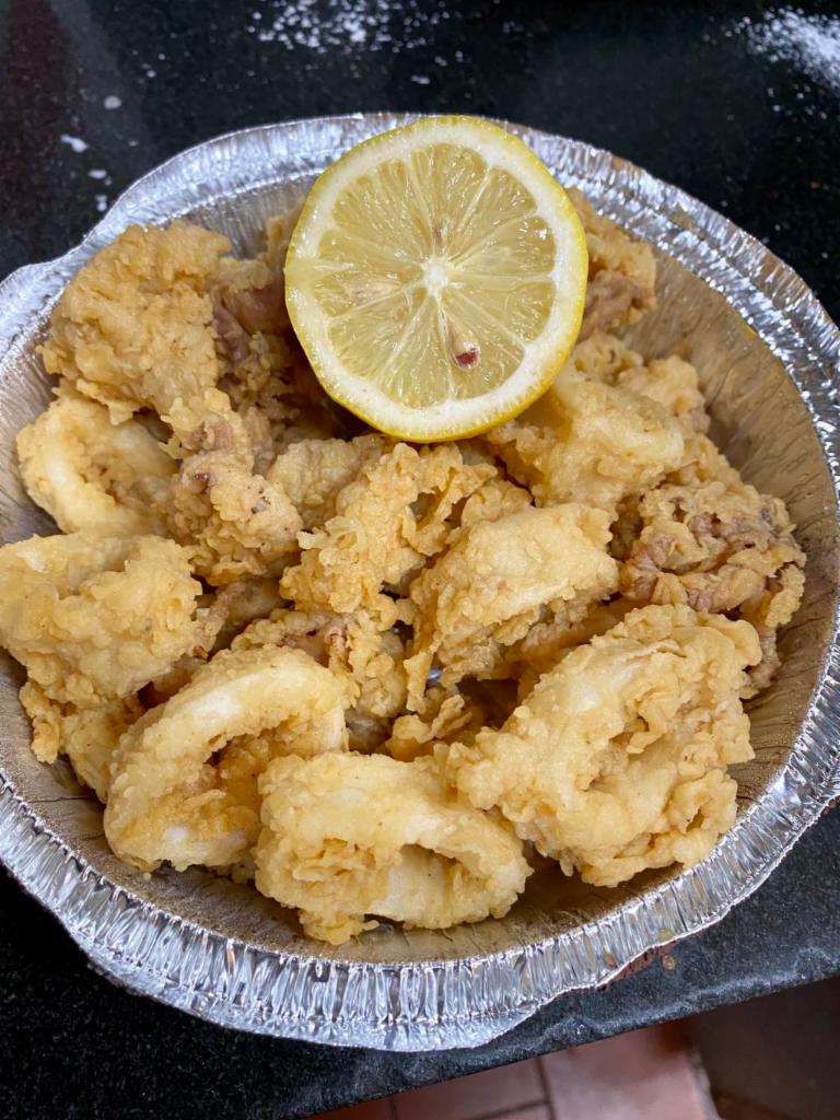 Fried Calamari · Battered squid and deep fried till golden brown.