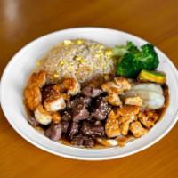 Filet Mignon, Chicken and Shrimp Combo · Includes fried rice, brown rice or white rice also served with broccoli, onion, zucchini and...