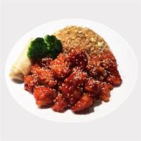 Sesame Chicken Dinner Combo · Includes fried rice, brown rice or white rice. Served with vegetable spring roll.