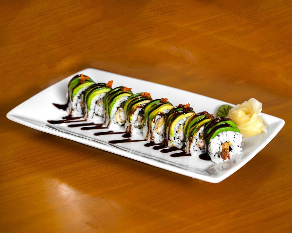 Dragon Roll · With tempura shrimp, eel and cream cheese, eel sauce, avocado and masago on top.