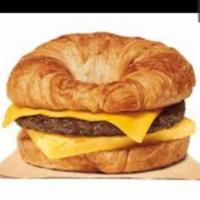 Turkey Sausage Patty Eggs And Cheese Croissant  · 2 eggs, Turkey Sausage patty and cheese on Croissant 