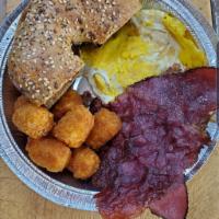 Eggs Platter With Your Choice Of Meat And Potatoes  · Two egg of your choice. Your choice of meat. Your choice of potatoes, home fries, tater tots...