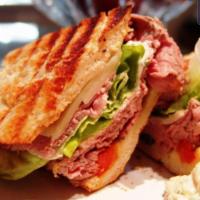 Boar's Head Ham And Turkey Combo Panini  · Boar's Head roast beef and Turkey ham combo on flat Panini bread.  Choose your favorite dres...