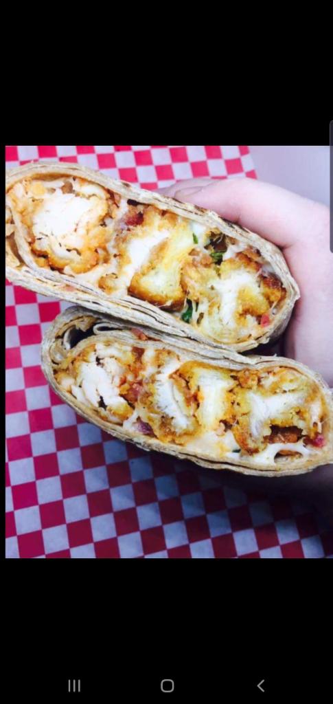 The Chicken Parmesan Wrap  · Breaded homemade chicken cutlet, fresh mozzarella, tomato sauce, parmesan cheese. Free can soda or water 