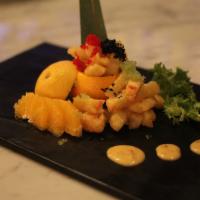 Rock Shrimp Tempura · breaded fried shrimp served with fresh orange in tangy sauce, top seller