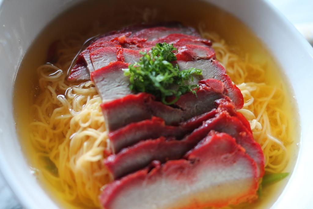 Roast Pork noodle soup · Cantonese style egg noodle with vegetable and topped with tender roast pork