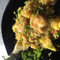 Pineapple Fried Rice with Shrimp · fresh pineapple, jumbo shrimp, peas carrots, onions, egg with curry spice