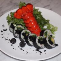Poseidon Special Roll · Lobster, eel, avocado, cucumber, mango, seaweed, black tobiko with eel sauce.