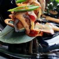 Crazy Tuna Roll · spicy crunchy tuna, asparagus, avocado inside topped with seared tuna avocado and jalapeno w...