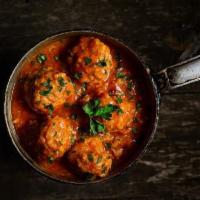 Meatballs · Three beef and pork meatballs smothered in marinara sauce topped with shaved parmigiano chee...