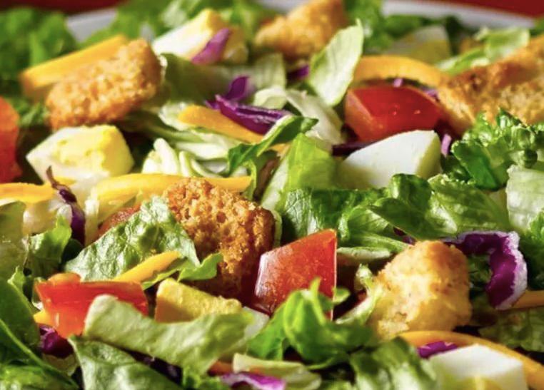 NY House Salad · Fresh, mixed greens, tomatoes, shredded carrots, croutons, mozzarella cheese and your choice of dressing.
