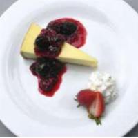 New York Style Cheesecake · Our famous NY style cheesecake on a layer of cookie crust, drizzled with your favorite toppi...