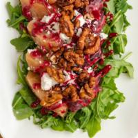 Red and Golden Beet - Goat Cheese Salad · Baby arugula, roasted red and golden beets, goat cheese, candied walnuts and sherry vinaigre...
