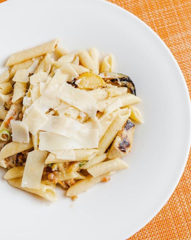 Mediterranean Pasta with Grilled Vegetables · Penne with grilled squash and zucchini, roasted artichoke hearts, fresh tomatotossed with olive oil, garlic and Parmesan cheese.