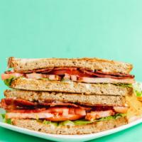 Avocado BLT Sandwich · Avocado, turkey bacon, lettuce, tomato and mayonnaise on toasted organic 7-grain bread.