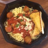 Spaghetti with Meatballs · Spaghetti in a rich house-made marinara sauce. Includes garlic bread and either house or Cae...