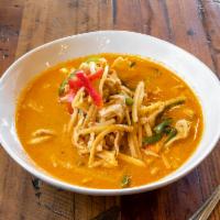 Red Curry · With coconut milk, bamboo shoot, string, bell pepper and Thai basil.