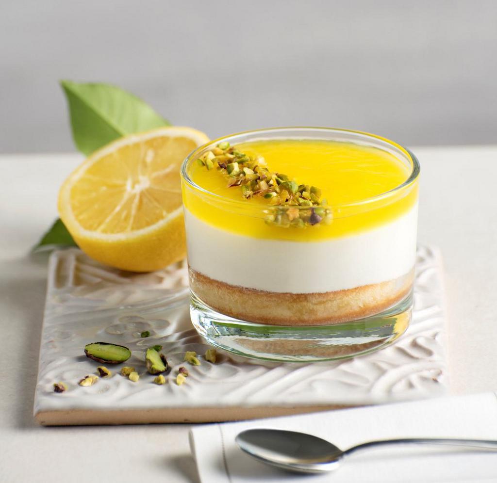 Coppa Lemon Vanilla pistachio · Sponge cake soaked in lemon juice followed by vanilla flavored cream, topped with lemon sauce & chopped pistachios. Each cup contains 1.2 oz. of fresh lemons from Sorrento PGI.
