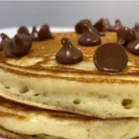 Chocolate Chip Pancakes · 3 Homestyle pancakes with chocolate chips, powder sugar and a side of Nutella. Yummy
