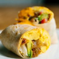 Chorizo Breakfast Burrito · Pork chorizo, 3 cheesy scrambled eggs, choice of potatoes, fresh avocado, pico de gallo and ...