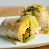 Veggie Breakfast Burrito · 3 cheesy scrambled eggs, choice of potatoes, avocado, crispy spinach and fresh sliced tomato...
