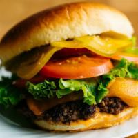 Dash Burger · Fresh grilled patty served on a brioche bun with burger aioli, crispy lettuce, tomatoes, red...