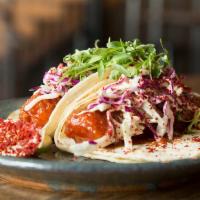 Baja Fish Tacos · State Park Blonde beer batter + miso glaze + cabbage slaw.