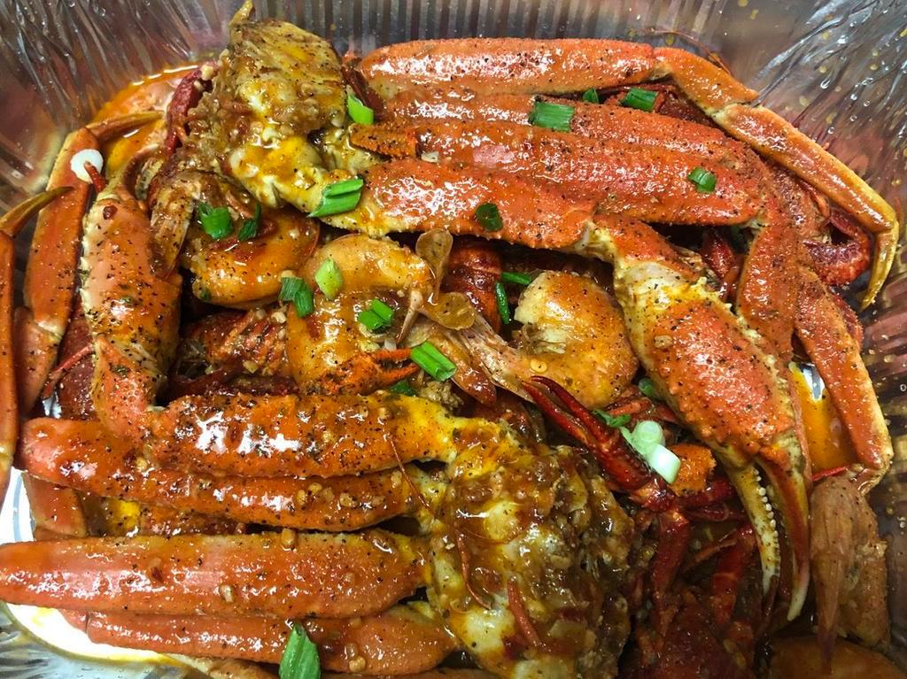 Family Seafood Pot · 2 Snow Crab Cluster,12 Headless Jumbo Shrimp,1 Lb Craw-fish with Spicy Creole Lemon Butter Sauce