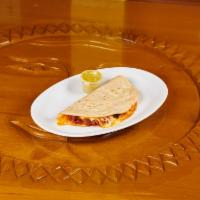 Quesadillas · Our quesadillas are made of Doña Maria flour tortillas which are made fresh daily.