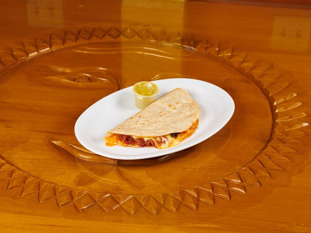 Quesadillas · Our quesadillas are made of Doña Maria flour tortillas which are made fresh daily.