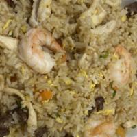 Combo Fried Rice  · House special garlic oil, egg, onions, shrimp, chicken, beef.