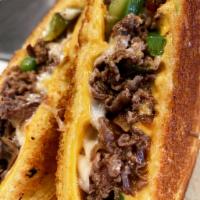 Philly Steak Melt · Thinly shaved beef, American and provolone cheeses, grilled onions and peppers and our house...