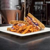 The Rick Ruben Sandwich · Slow smoked house-cured pastrami with Swiss cheese, DB house red cabbage sauerkraut, and a R...