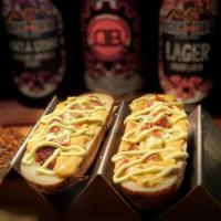 Love It When Call Me Big Papa · A large slow-smoked baked potato 1/2 with spicy beer cheese extra bacon, queso fresco, pobla...