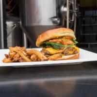 The Huckleberry Burger · Double meat, 2 slices of American cheese, DB Lager caramelized onions, spinach, tomato, hous...