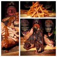 Deadbeach #1 Meal · 8 oz. slow smoked brisket, 1 whole large sausage link, 1/2 rack of ribs, 2 pieces of Texas t...