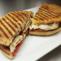 Boston Chicken Panini · Grilled chicken, roasted red peppers, fresh mozzarella, basil and balsamic vinegar.