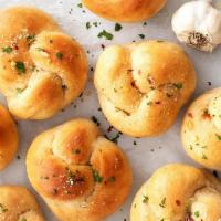 Garlic Knots · Comes with marinara sauce.