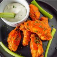 Homemade Wings · Buffalo, BBQ, Carolina BBQ, hot honey for an additional charge, with celery and bleu cheese.