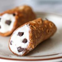 Cannoli · Fried pastry with a sweet creamy filling. 