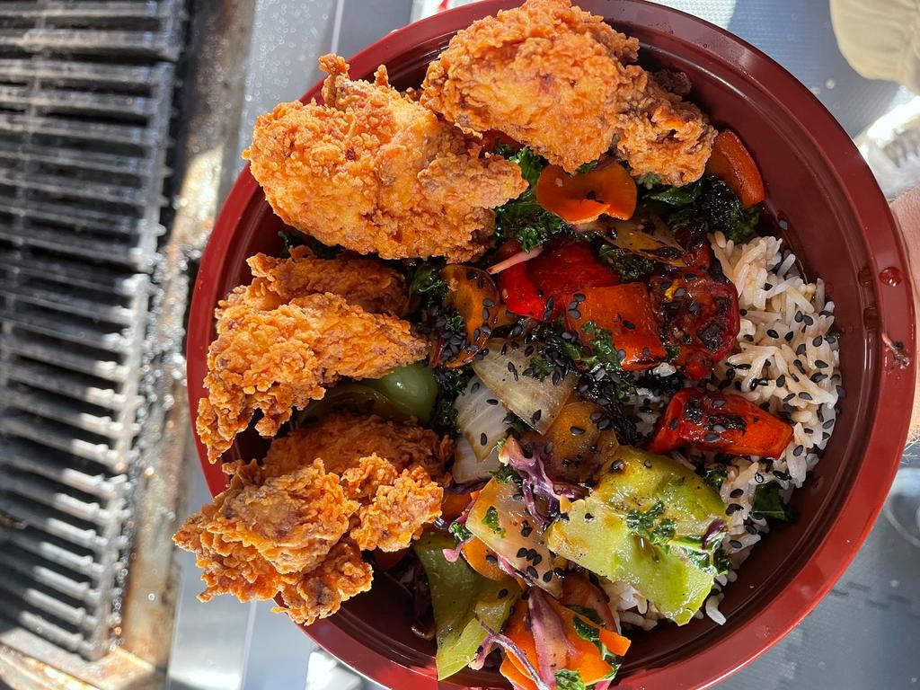 Veggie Rice Bowl · Broccoli, red & green bell peppers, onions, white rice, choice of sauce. Add steak, fried chicken or pork for an additional charge.