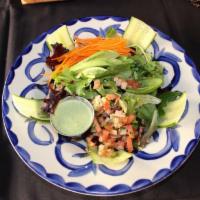 El Dorado House Salad · Mixed greens, cucumber, carrots, fresh Hass avocados and pico de gallo with house-made cilan...