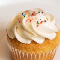 Vanilla Butter Cupcake · Soft vanilla cake topped vanilla buttercream frosting and sprinkles