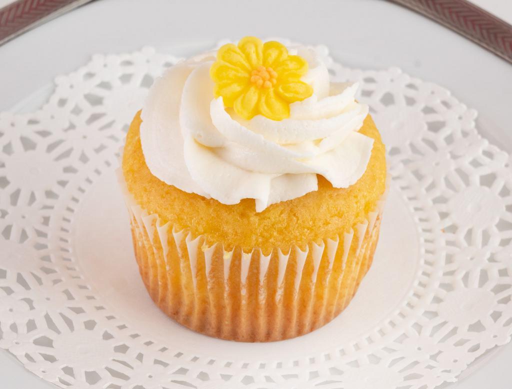 Lemon Cupcake · A soft Lemon cake topped with a light  and fluffy buttercream frosting.