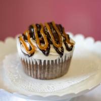 Salted caramel turtle brownie · Rich moist chocolate cake drizzled with chocolate & caramel, topped with brownie bites, and ...