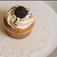 Oreo Cupcake · Soft vanilla cake with oreo cookies baked into the batter, topped with buttercream frosting ...