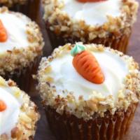 Carrot Cake · This carrot cake has a hint of ginger, topped with pecans & buttercream frosting.