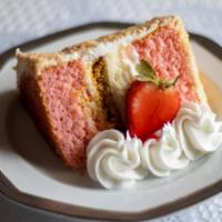 Strawberry  Crunch Cake Slice · Two moist layers of strawberry cake with a layer of cheesecake in between, served with fresh...