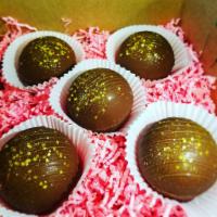Milk chocolate  · chocolate sphere filled with hot chocolate mix and lots of marshmallows! Pour steaming hot m...